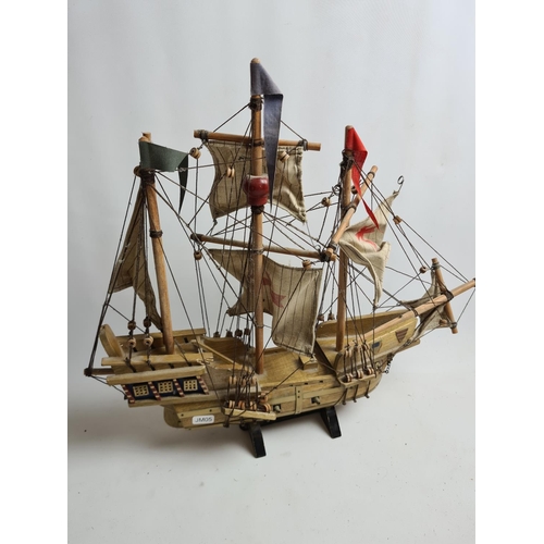 182 - Three wooden model ships