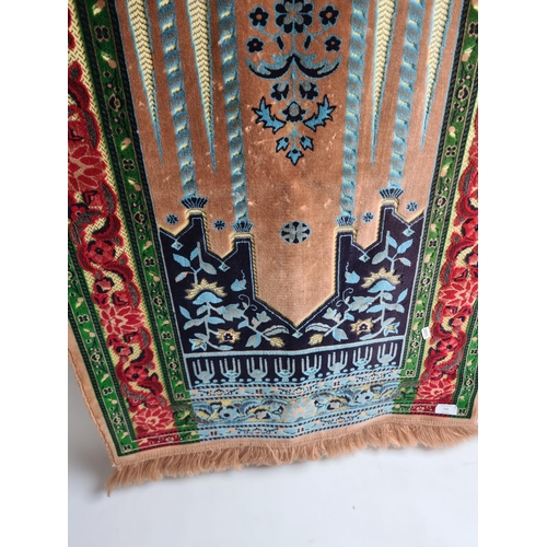 192 - Two items, a Turkish Dokuteks rug and a vintage brass bugle