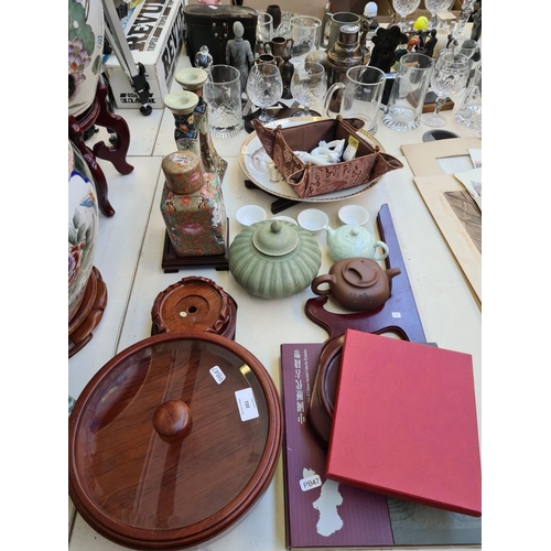 201 - A collection of various oriental items to include a Chinese rosewood effect Lazy Susan, pair of porc... 