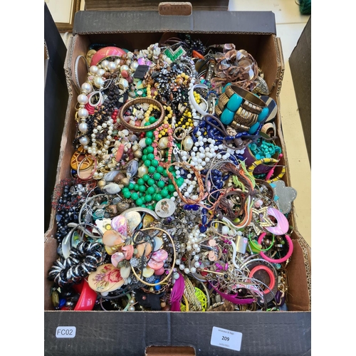 208 - A box containing a large quantity of various costume jewellery