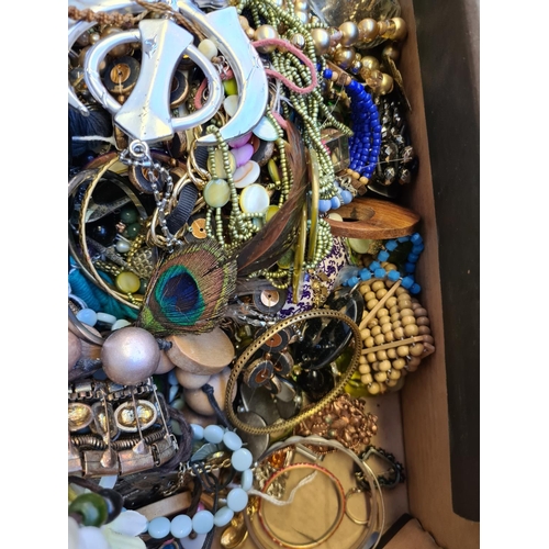 209 - A box containing a large quantity of various costume jewellery