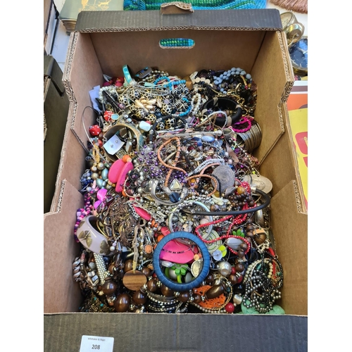 210 - A box containing a large quantity of various costume jewellery