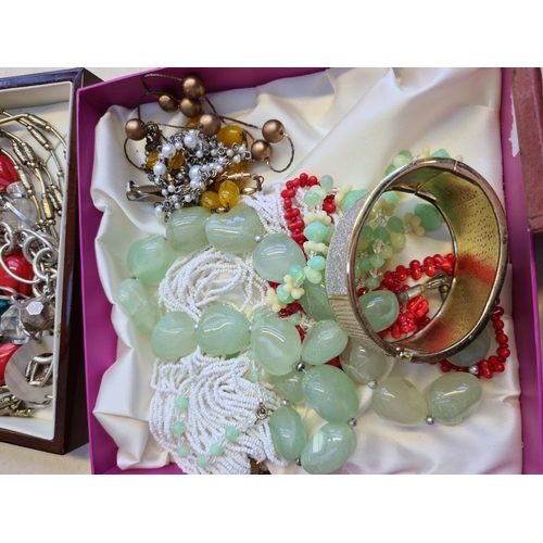 211 - A large quantity of various costume jewellery to include Sterling silver trio earring set, stamped 9... 