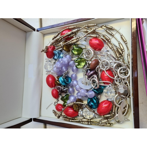 211 - A large quantity of various costume jewellery to include Sterling silver trio earring set, stamped 9... 