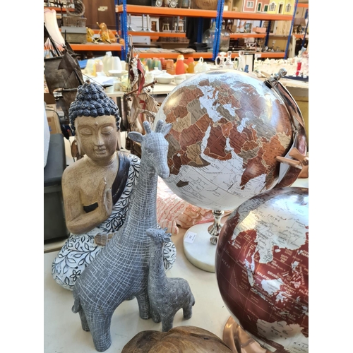 214 - Seven various household ornaments to include Designer Accent globe, carved wooden duck figurine, Jef... 