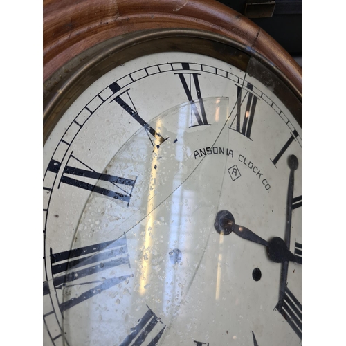 215 - An early 20th century Ansonia Clock Co. of America circular wall clock