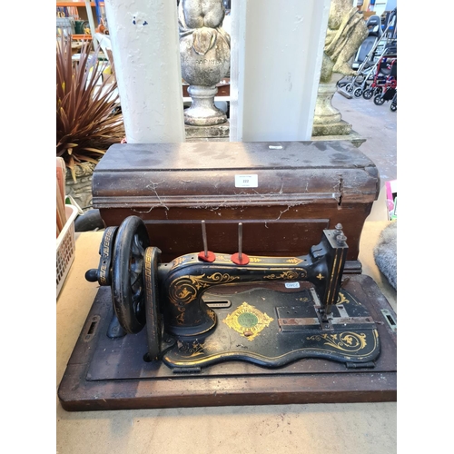 222 - A vintage cased Jones sewing machine