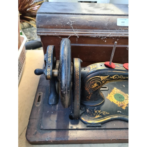 222 - A vintage cased Jones sewing machine