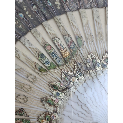 227 - A cased 19th century ivory fan with hand painted peacock design - approx. 62cm wide x 36cm high (inc... 