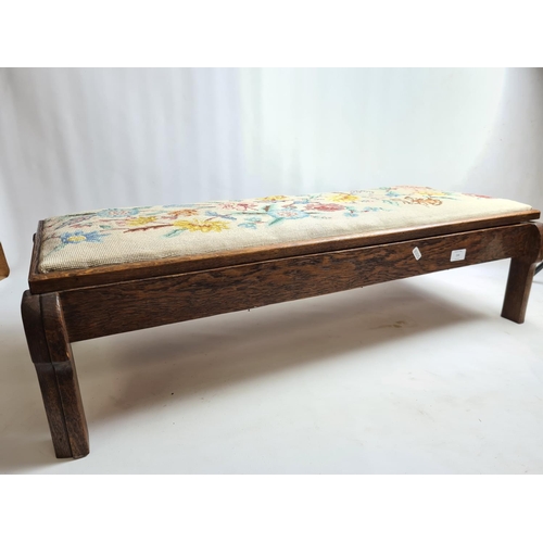 233 - An early 20th century oak and tapestry rectangular storage stool containing various sewing accessori... 