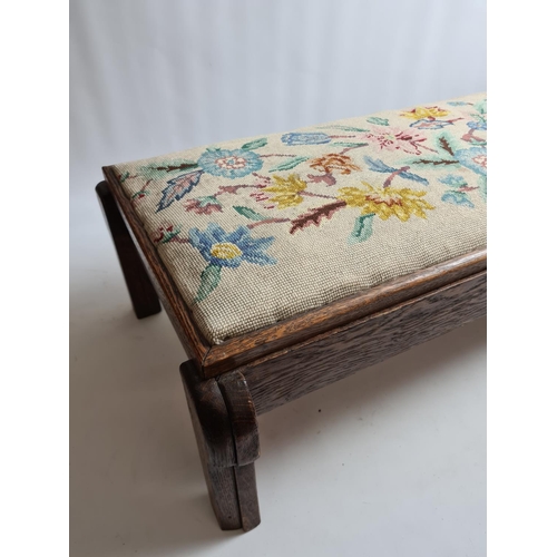 233 - An early 20th century oak and tapestry rectangular storage stool containing various sewing accessori... 