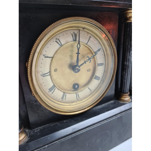 235 - A Victorian black slate mantel clock with pendulum and key - approx. 32cm wide x 26cm high 13cm deep