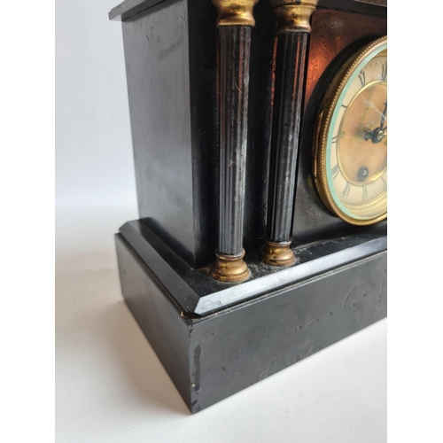 235 - A Victorian black slate mantel clock with pendulum and key - approx. 32cm wide x 26cm high 13cm deep