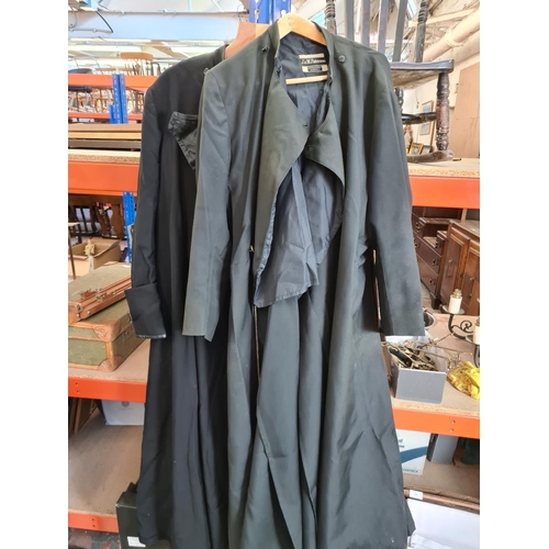 237 - Two vintage black Vicar's robes to include one J. Wippell & Co. Ltd. and one J & M Patterson