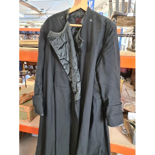 237 - Two vintage black Vicar's robes to include one J. Wippell & Co. Ltd. and one J & M Patterson