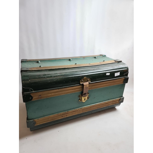 239 - A vintage green metal travel trunk