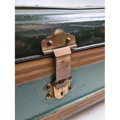 239 - A vintage green metal travel trunk