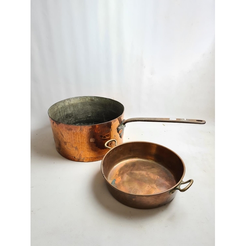 244 - Two items, a late 19th/early 20th century Leon Jaeggi copper saucepan - approx. 36cm in diameter and... 