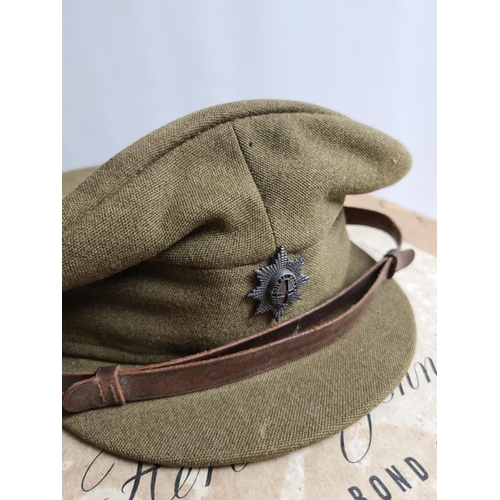 246 - Two vintage military caps with Coldstream Guards badges, one officer's forage cap and one green both... 