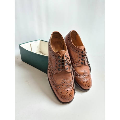 248 - A pair of size 9 Loake tan leather Derby brogues