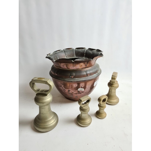 252 - An Arts and Crafts aspidistra copper planter and four various brass weights