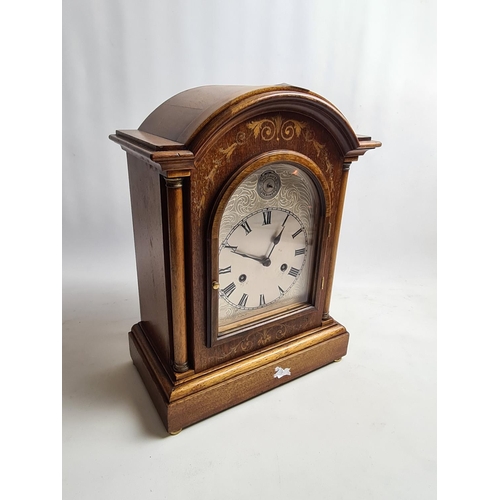 257 - An Edwardian inlaid mahogany cased bracket clock with later added Silent Chime face, labelled 