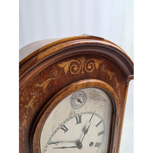 257 - An Edwardian inlaid mahogany cased bracket clock with later added Silent Chime face, labelled 