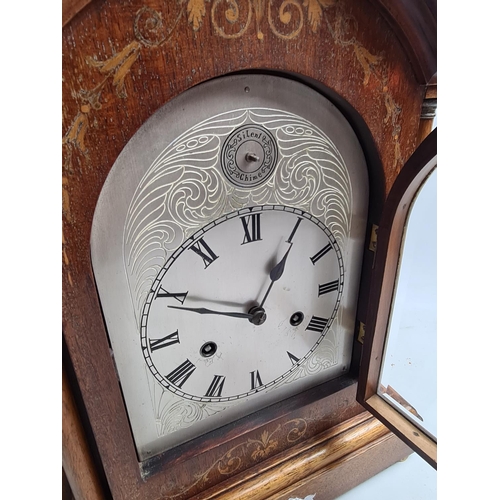 257 - An Edwardian inlaid mahogany cased bracket clock with later added Silent Chime face, labelled 