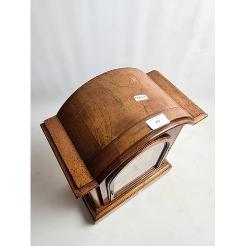 257 - An Edwardian inlaid mahogany cased bracket clock with later added Silent Chime face, labelled 