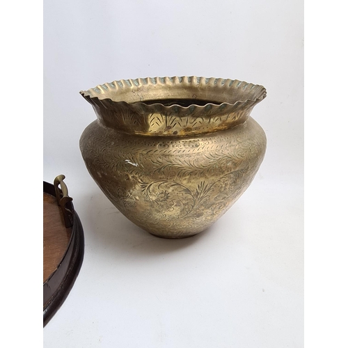 259 - Two items to include a Middle Eastern brass planter and a Georgian inlaid mahogany kidney shaped twi... 