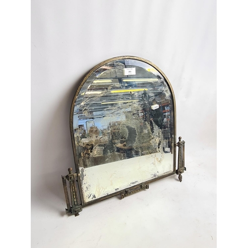 261 - A vintage brass framed bevelled edge wall hanging mirror