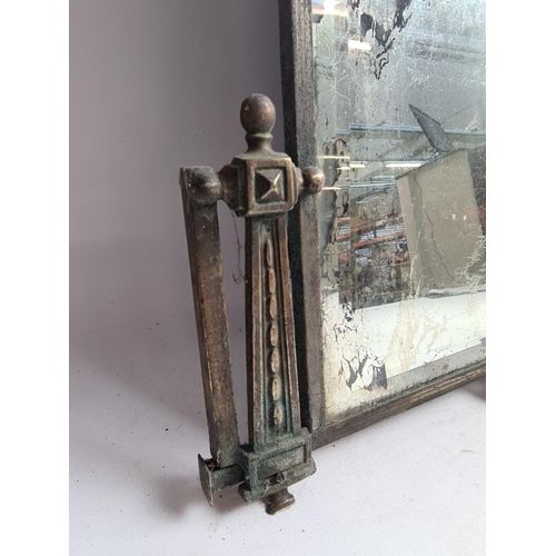 261 - A vintage brass framed bevelled edge wall hanging mirror