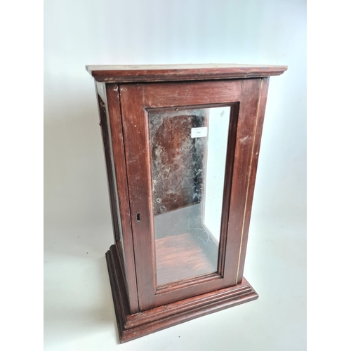 265 - A mid 20th century stained oak shop display cabinet