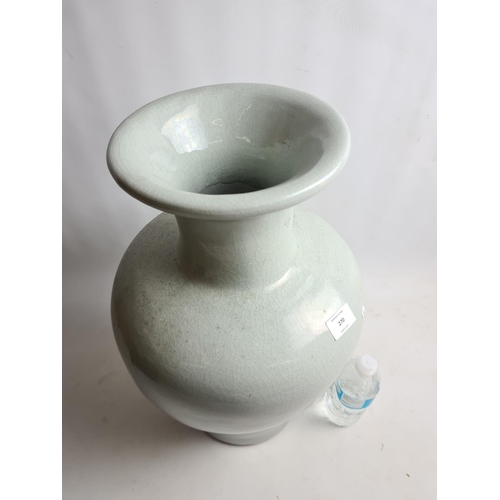 270 - A large Chinese Celadon vase - approx. 54cm high