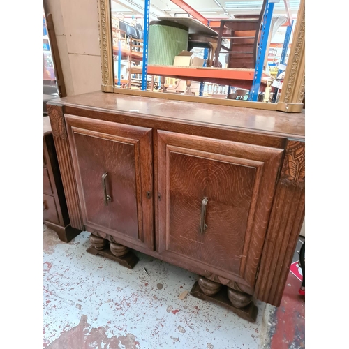 272 - An Art Deco oak sideboard - approx. 122cm wide x 46cm deep x 100cm high