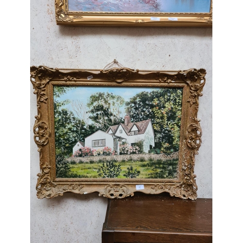 287 - A gilt framed oil on canvas of a cottage scene signed PLH - approx. 75cm x 69cm