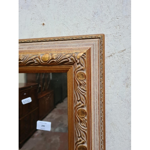 290 - A large gilt framed wall mirror - approx. 121cm x 91cm