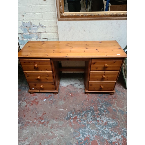 291 - A modern pine dressing table - approx. 133cm wide x 69cm high x 47cm deep