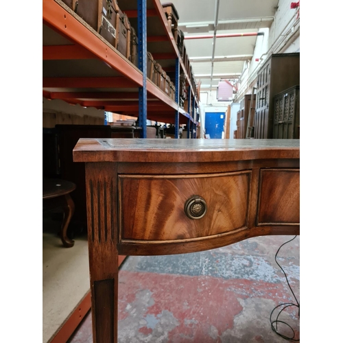 293 - A Regency style mahogany writing table with green leather insert - approx. 78cm high x 94cm wide x 4... 