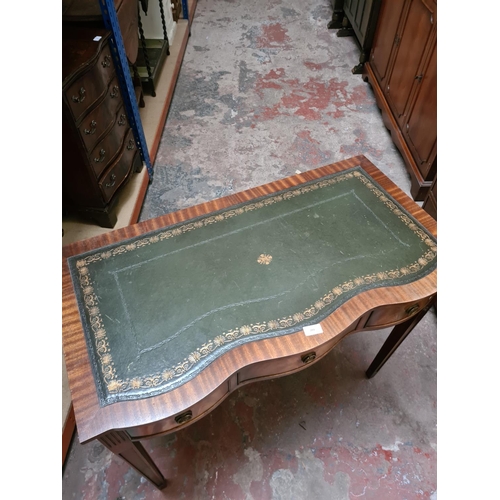 293 - A Regency style mahogany writing table with green leather insert - approx. 78cm high x 94cm wide x 4... 