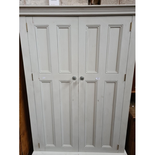 301 - A grey painted pine double wardrobe - approx. 196cm high x 110cm wide x 55cm deep