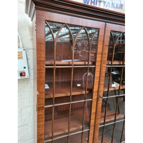 306 - A mahogany display cabinet - approx. 101cm wide x 185cm high x 35cm deep