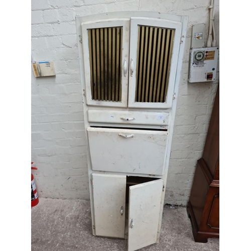 307 - A mid 20th century white painted kitchen cabinet