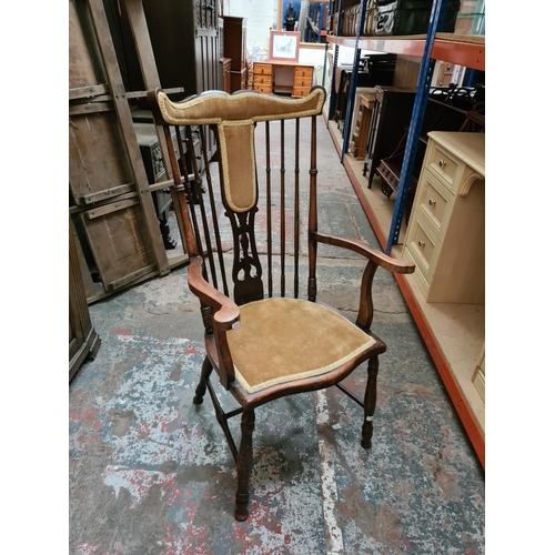 313 - An Edwardian mahogany and gold upholstered carver dining chair