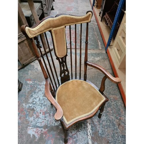 313 - An Edwardian mahogany and gold upholstered carver dining chair