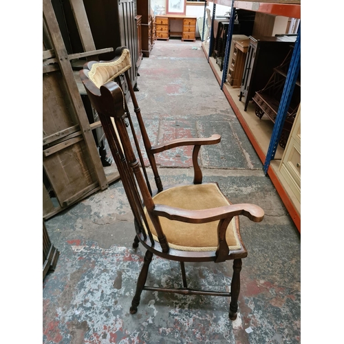 313 - An Edwardian mahogany and gold upholstered carver dining chair