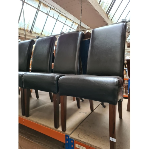 314 - A set of four modern brown leatherette dining chairs