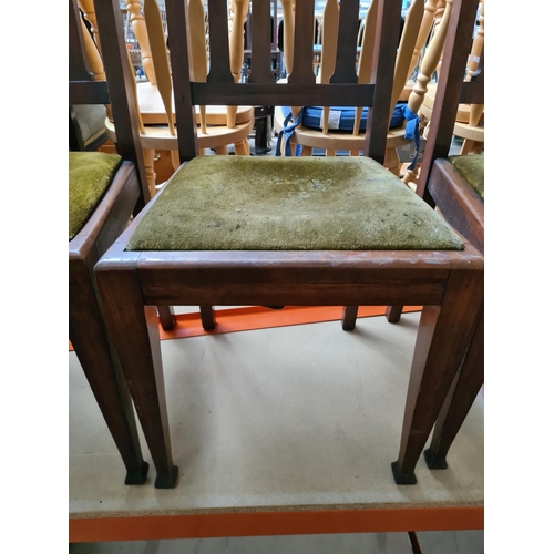 315 - A set of four Edwardian mahogany dining chair with green upholstery