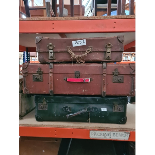 320 - Three various vintage suitcases