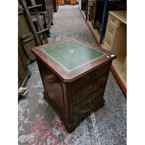 327 - A mahogany two drawer filing cabinet with green leather insert